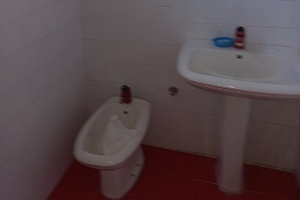 Kuća, IV zona, Kozluk. Zidana od čvrstog materijala, suteren, prizemlje i sprat...
